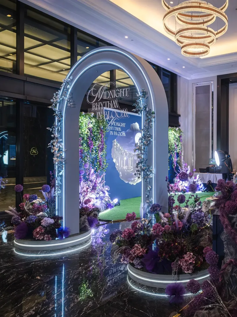 Midnight Rhythm in Bloom corporate gala by La Memoria — floral entrance arch and lounge styling, Kuala Lumpur